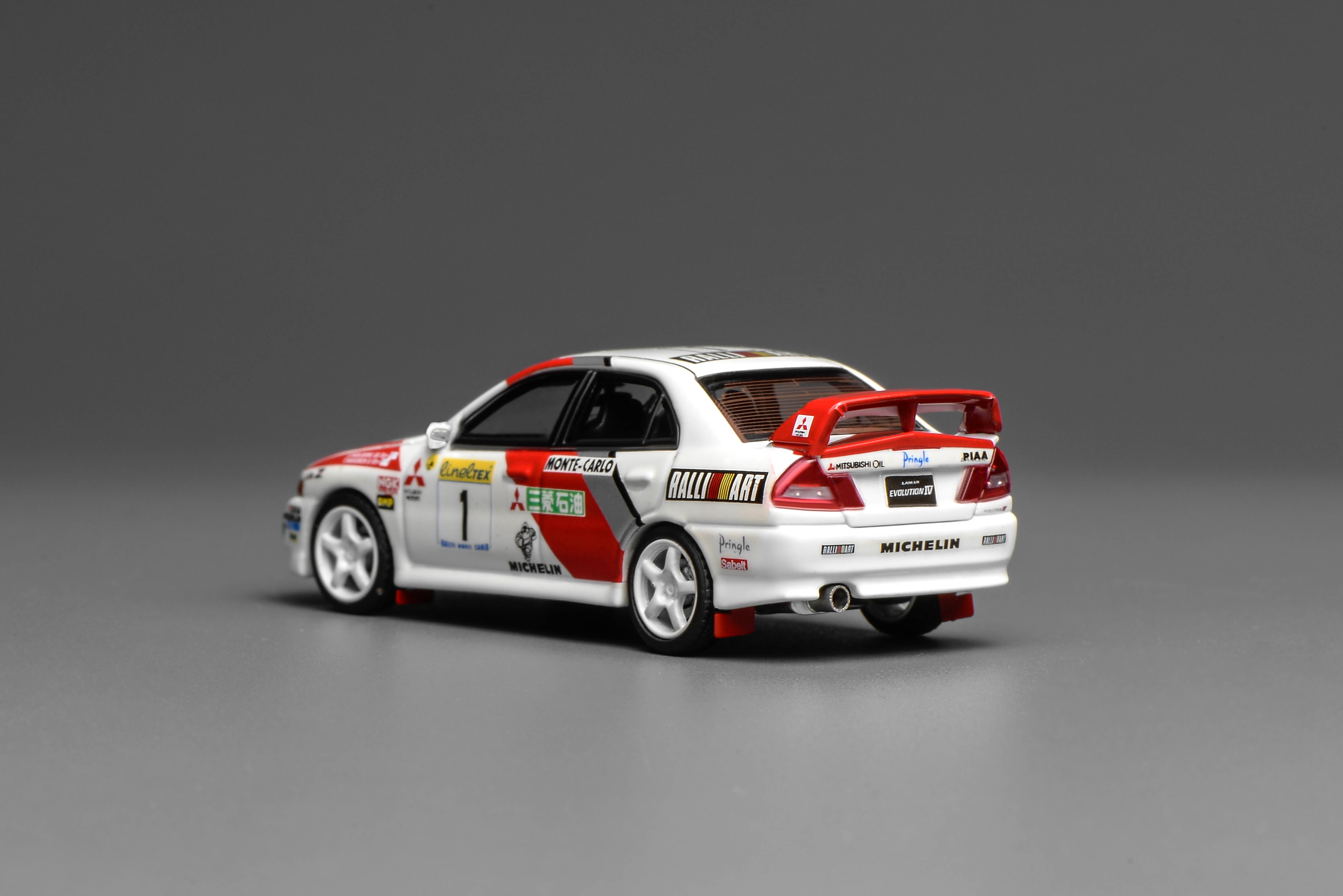 [MOTORHELIX] 1:64 Mitsubishi Lancer Evolution IV GSR Monte Carlo Livery
