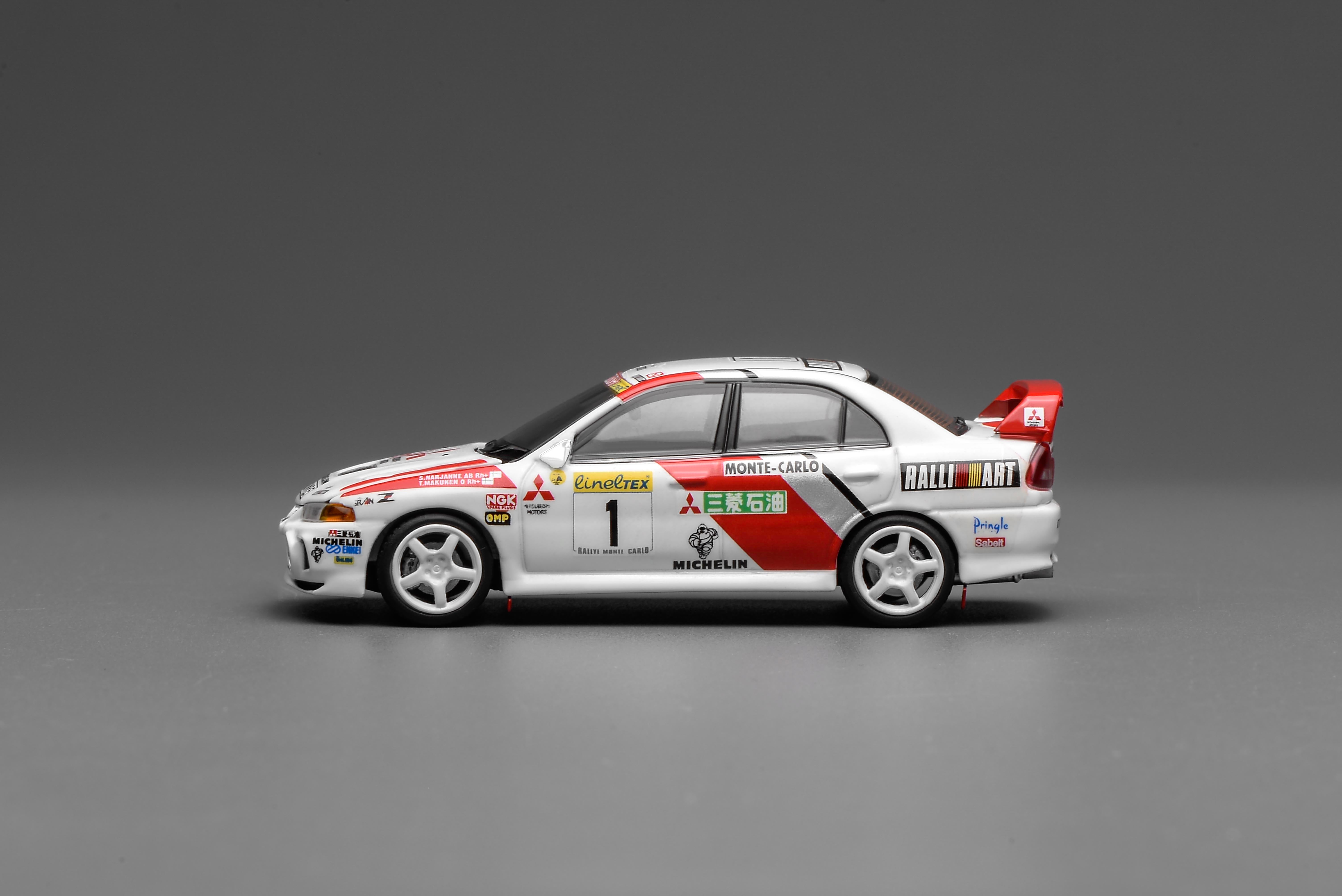 [MOTORHELIX] 1:64 Mitsubishi Lancer Evolution IV GSR Monte Carlo Livery