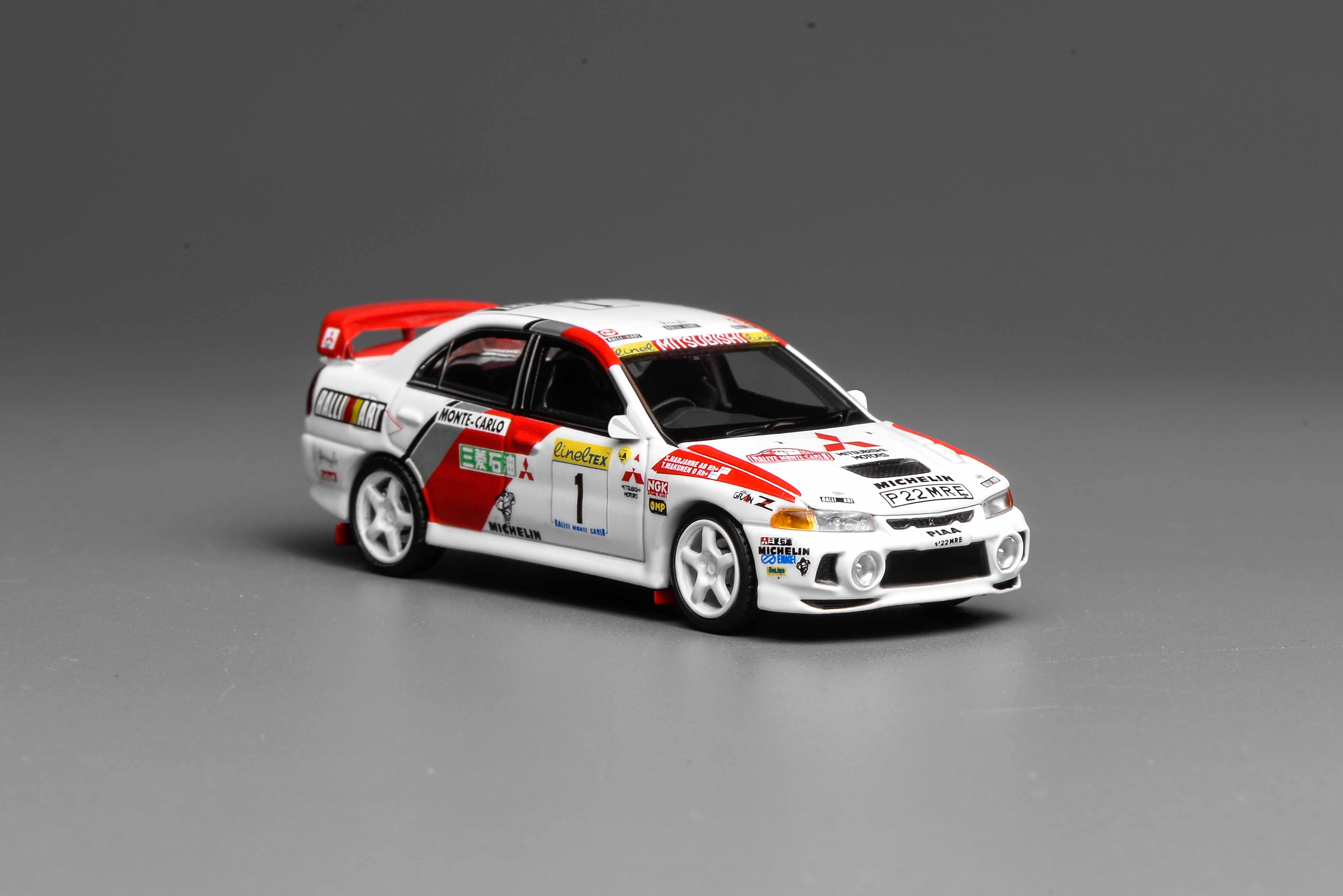 [MOTORHELIX] 1:64 Mitsubishi Lancer Evolution IV GSR Monte Carlo Livery