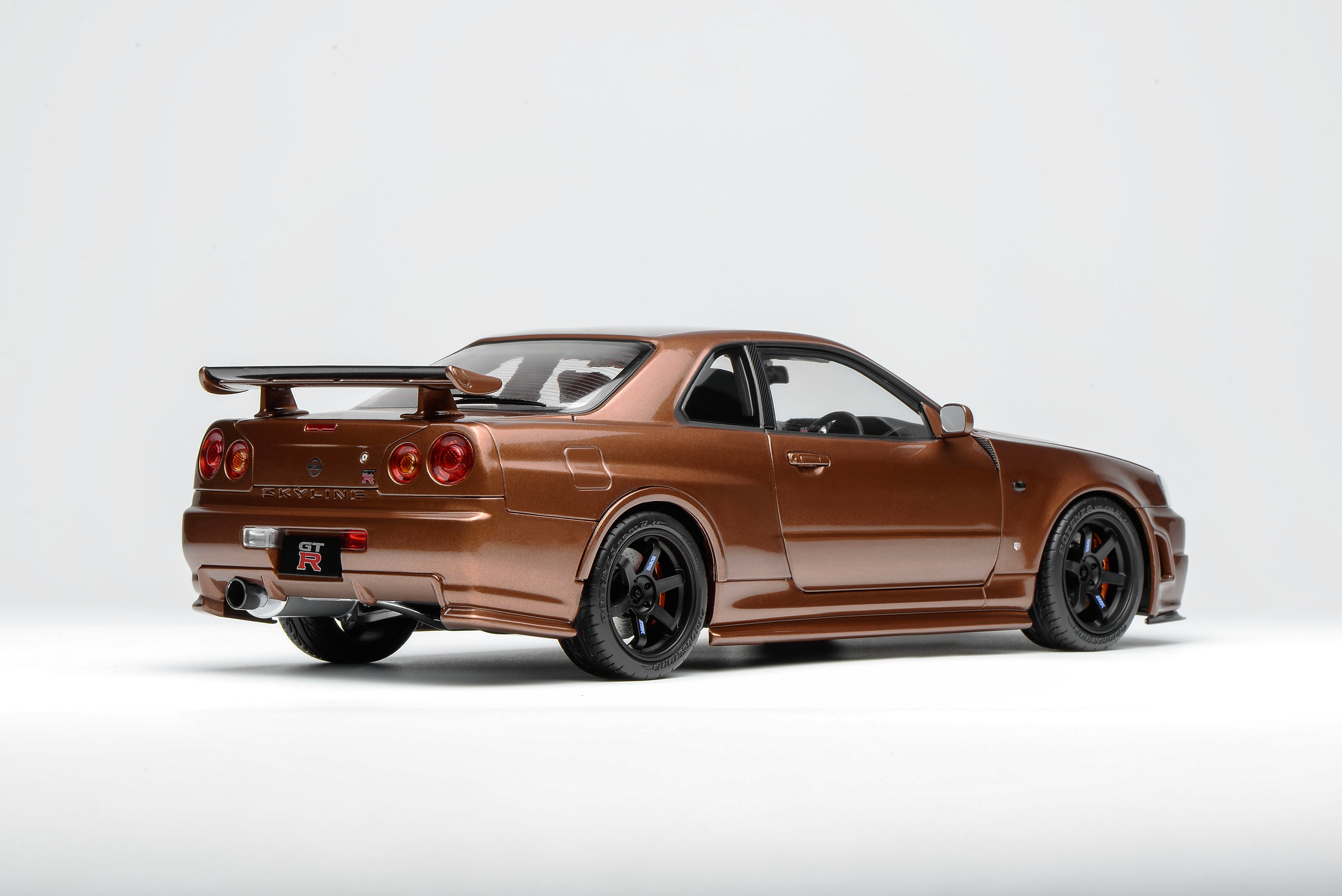 [MOTORHELIX] 1:18 Nissan Skyline GT-R (R34) Customized Version Metallic Bronze