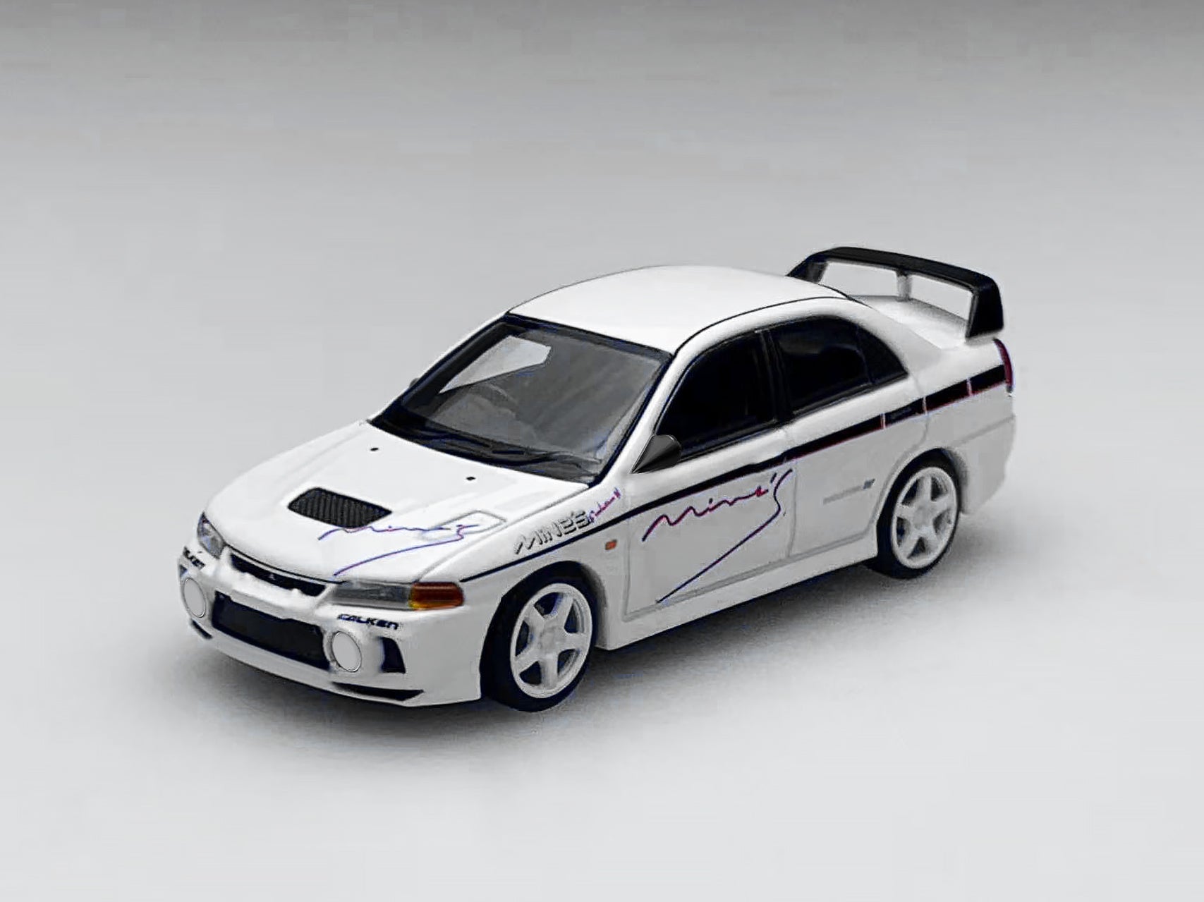 [MOTORHELIX] 1:64 Mitsubishi Lancer Evolution IV GSR Mine's Livery