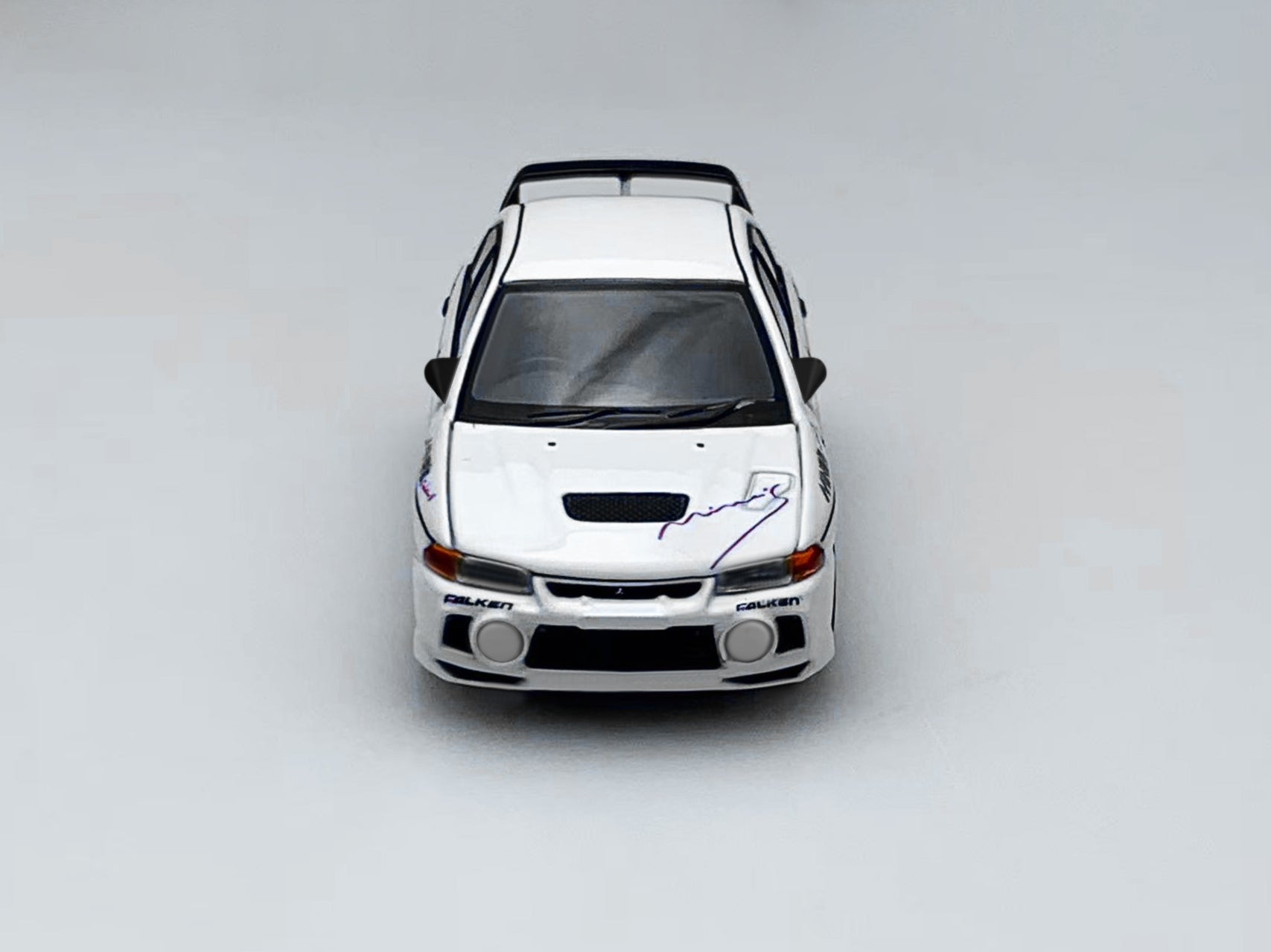 [MOTORHELIX] 1:64 Mitsubishi Lancer Evolution IV GSR Mine's Livery