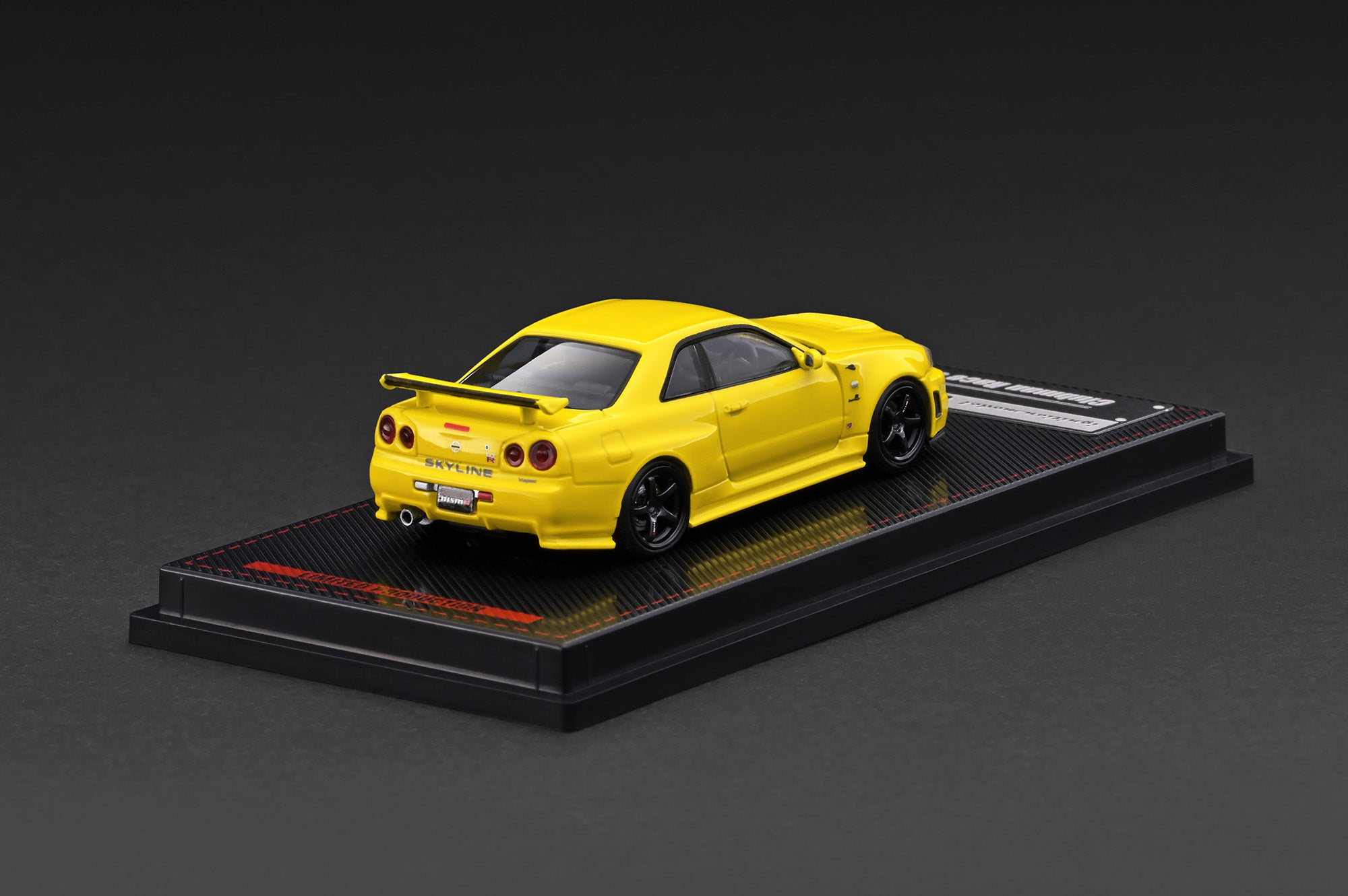 [IGNITION MODEL] 1:64 Nissan Skyline GT-R (BNR34) Nismo Customized Yellow Metallic [IG4176] - Toy Space Diecast Online Store Singapore