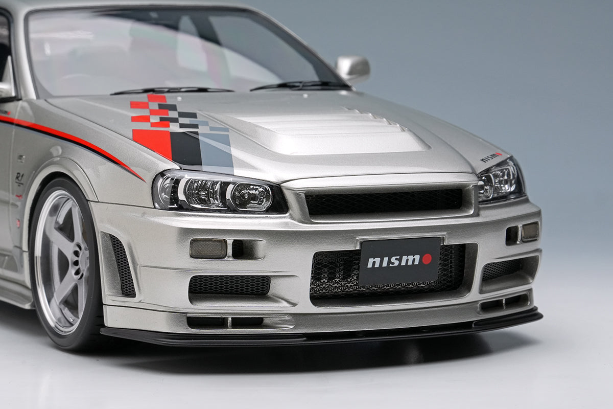 [MAKE UP] 1:18 Nissan Skyline GT-R (BNR34 NISMO R-Tune Version) 2004 Silver / NISMO Stripe [EML135A]