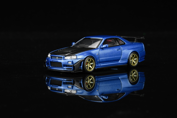 [MOTORHELIX] 1:64 Nissan Skyline GT-R (R34) Customized With GT Aero Kit Bayside Blue - Toy Space Diecast Online Store Singapore