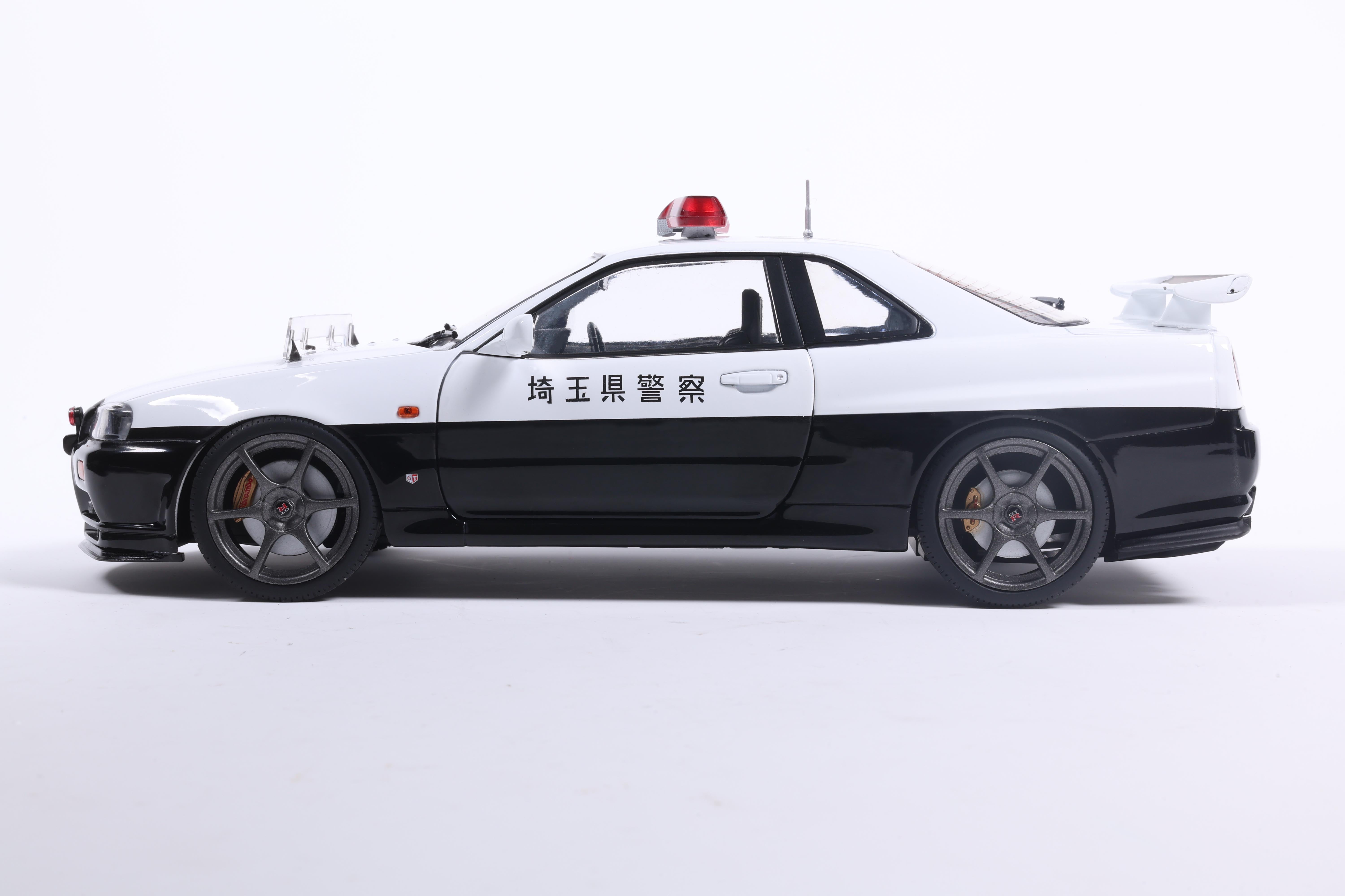 [SOLIDO] 1:18 Nissan Skyline GT-R (BNR34) Japanese Police White 1999 - Toy Space Diecast Online Store Singapore