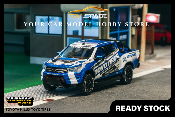 [TARMAC WORKS] 1:64 Toyota Hilux Toyo Tires - HOBBY64